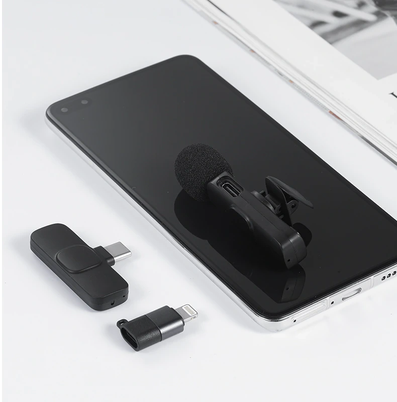 K9 Wireless Collar Mic clipped to a shirt collar